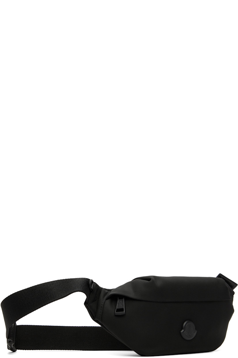 Nylon-blend canvas belt bag.

· Water-repellent
· Adjustable press-release belt-style strap
· D-ring at strap
· Logo hardware at face
· Zip pocket at back face
· Zip closure
· H5" x W13" x D2.5"

Supplier color: Black
