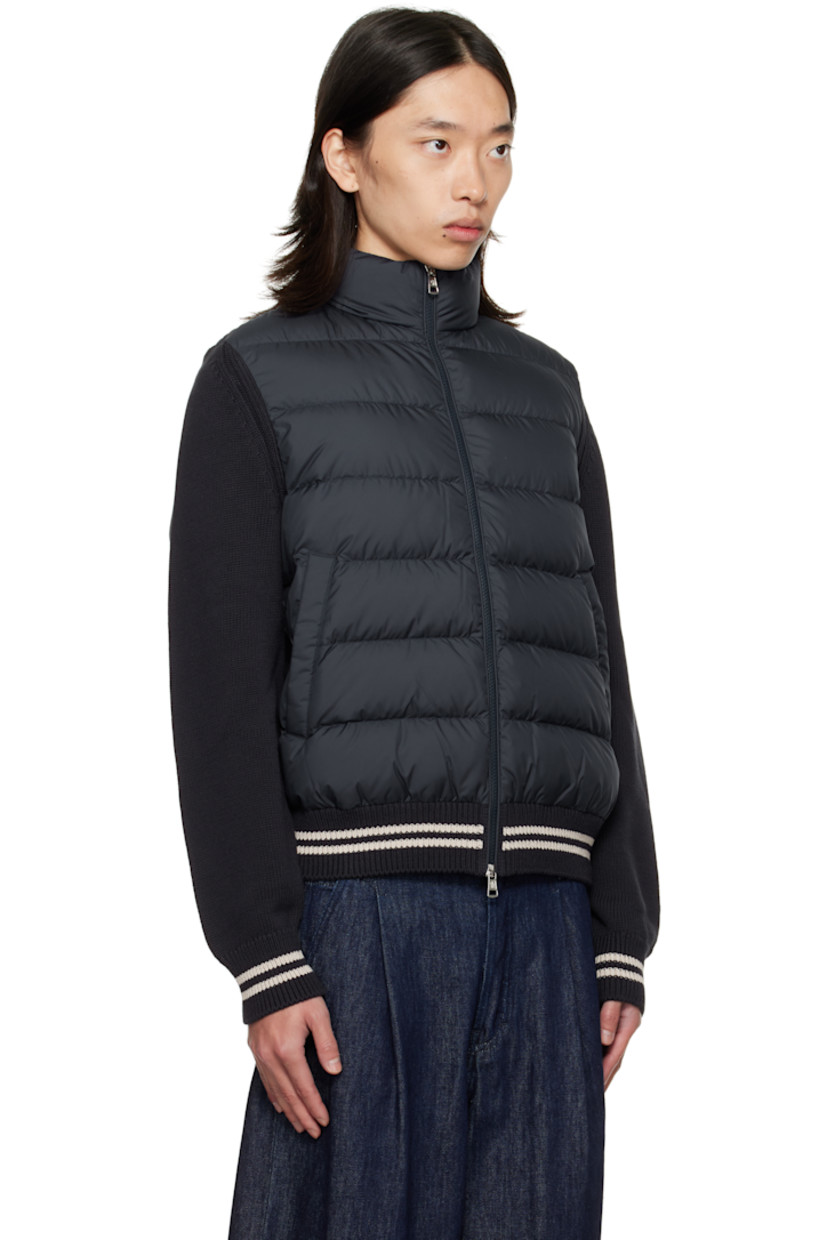 Down-filled quilted longue saison and stockinette-stitch knit cotton jacket. 

· DIST-certified down 
· 5-gauge knit
· Stand collar 
· Two-way zip closure
· Welt pockets at waist
· Stripes at rib-knit hem and cuffs
· Tricolor felted logo patch at sleeve
· Partial satin lining 

Supplier color: Night sky 

Fill: 90% goose down, 10% goose feather.