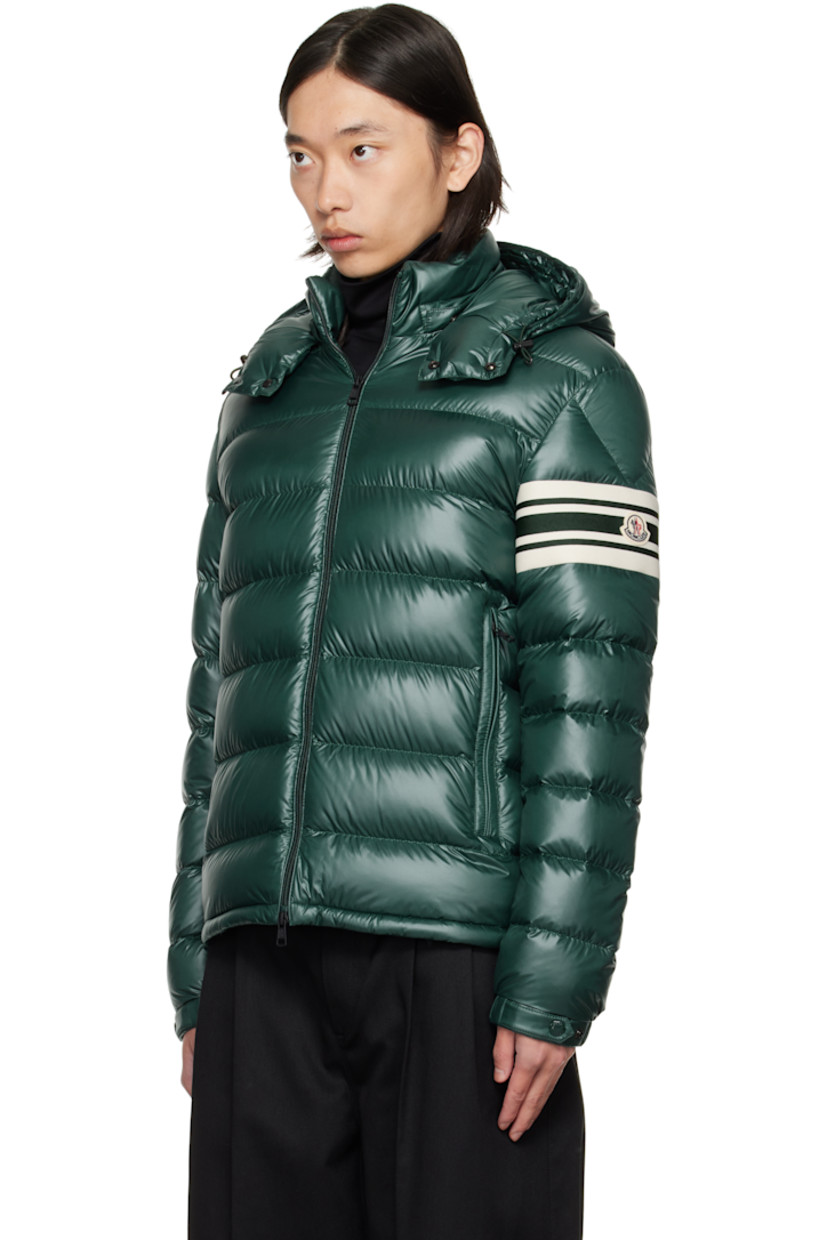 Quilted down-filled satin jacket.

· Detachable hood
· Stand collar
· Two-way zip closure 
· Zip pockets at waist
· Knit sleeve cuff with embroidered logo
· Adjustable press-stud cuffs
· Zip pocket at interior
· Satin lining

Supplier color: Sea moss

Fill: 90% down, 10% feathers.