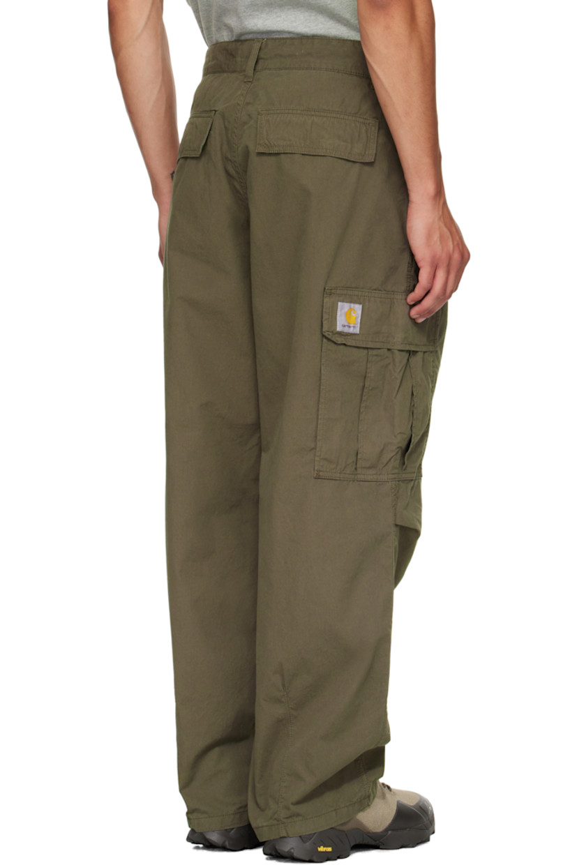 Garment-dyed 5.5 oz cotton Palatine poplin cargo pants.

· Loose-fit
· Belt loops
· Four-pocket styling
· Zip fly
· Dropped inseam
· Pleats at waist
· Tucks at knees
· Darts at legs
· Cargo pocket at outseams
· Logo patch at outseam

Supplier color: Arabusta