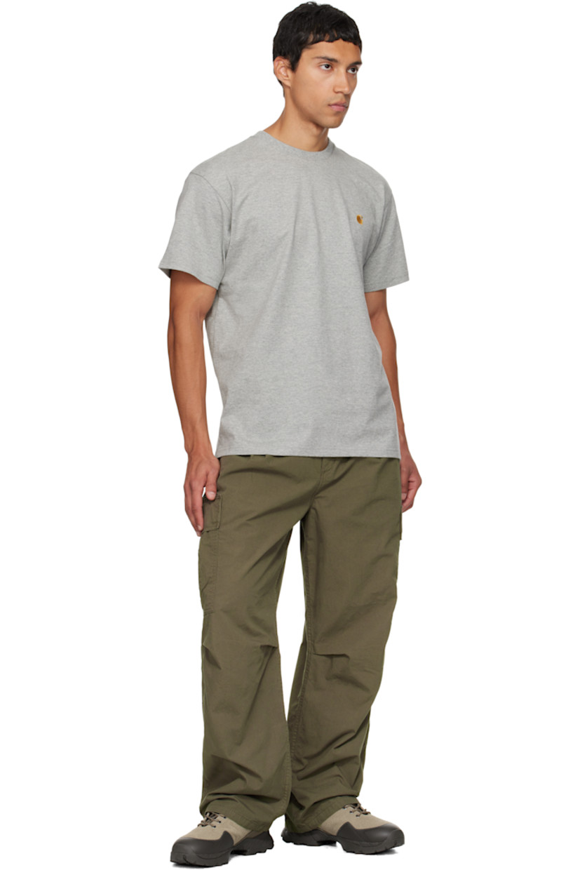 Garment-dyed 5.5 oz cotton Palatine poplin cargo pants.

· Loose-fit
· Belt loops
· Four-pocket styling
· Zip fly
· Dropped inseam
· Pleats at waist
· Tucks at knees
· Darts at legs
· Cargo pocket at outseams
· Logo patch at outseam

Supplier color: Arabusta
