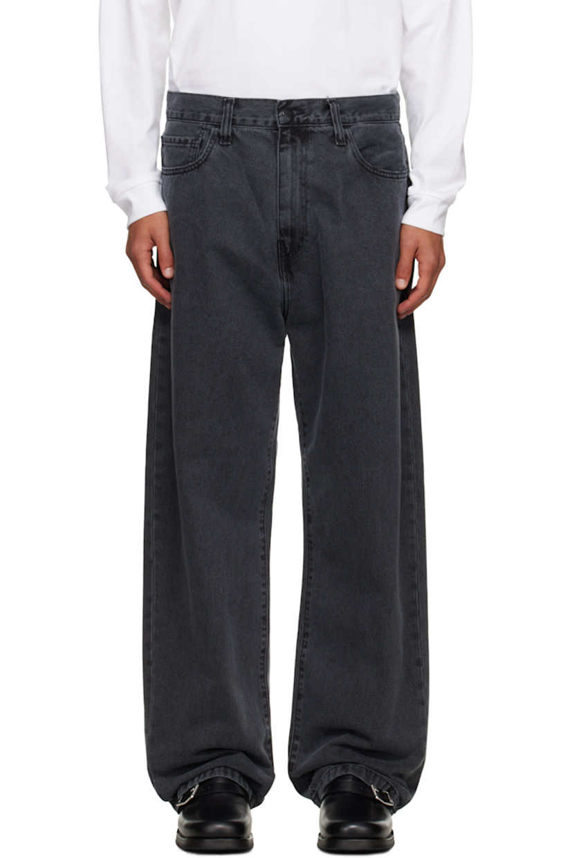 Stonewashed heavyweight 12 oz non-stretch denim jeans.

· Fading throughout
· Tapered, loose-fit
· Mid-rise
· Belt loops
· Five-pocket styling
· Zip fly
· Logo patch at back pocket

Supplier color: Black (Heavy Stone Wash)