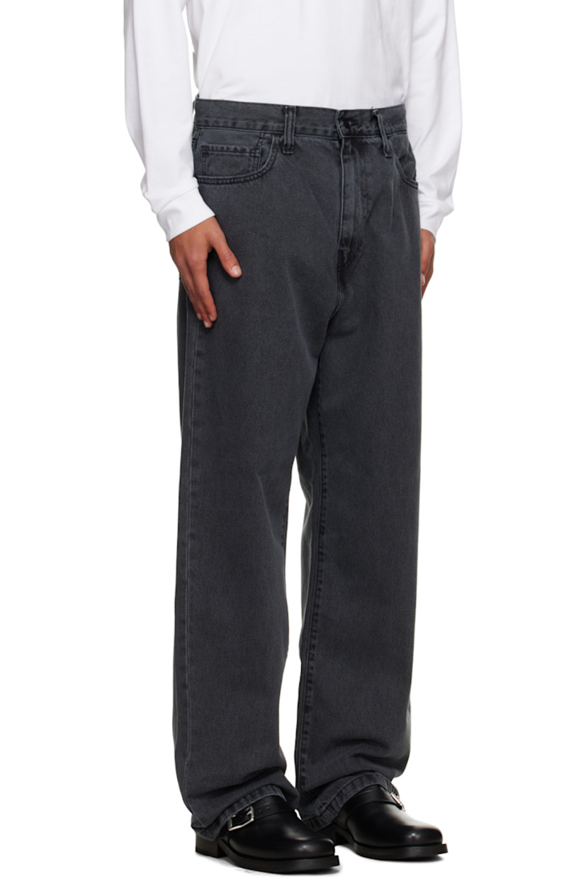Stonewashed heavyweight 12 oz non-stretch denim jeans.

· Fading throughout
· Tapered, loose-fit
· Mid-rise
· Belt loops
· Five-pocket styling
· Zip fly
· Logo patch at back pocket

Supplier color: Black (Heavy Stone Wash)