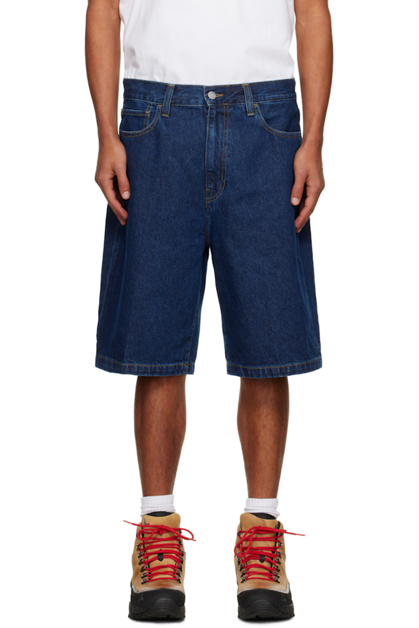 Stonewashed heavyweight 12 oz non-stretch denim shorts.

· Fading throughout
· Loose-fit
· Mid-rise
· Belt loops
· Five-pocket styling
· Zip fly
· Logo patch at back pocket
· Contrast stitching in tan

Supplier color: Blue (Stone Washed)