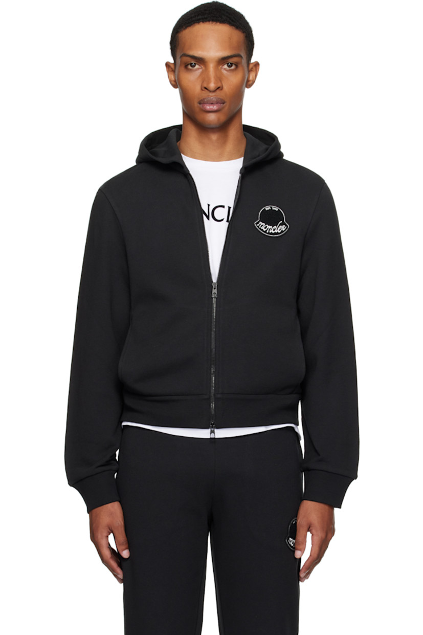 French terry hoodie.

· Two-way zip closure
· Bouclé logo patch at chest
· Seam pockets
· Rib-knit hem and cuffs

Supplier color: Black