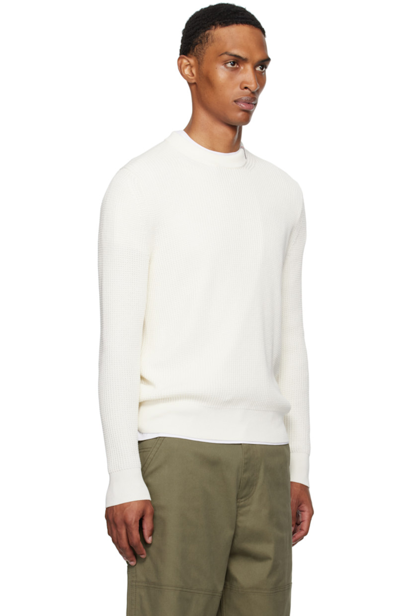 Waffle-knit cotton sweater.

· Rib-knit crewneck, hem, and cuffs
· Stripes embroidered at collar
· Rubberized logo patch at sleeve

Supplier color: Jet stream