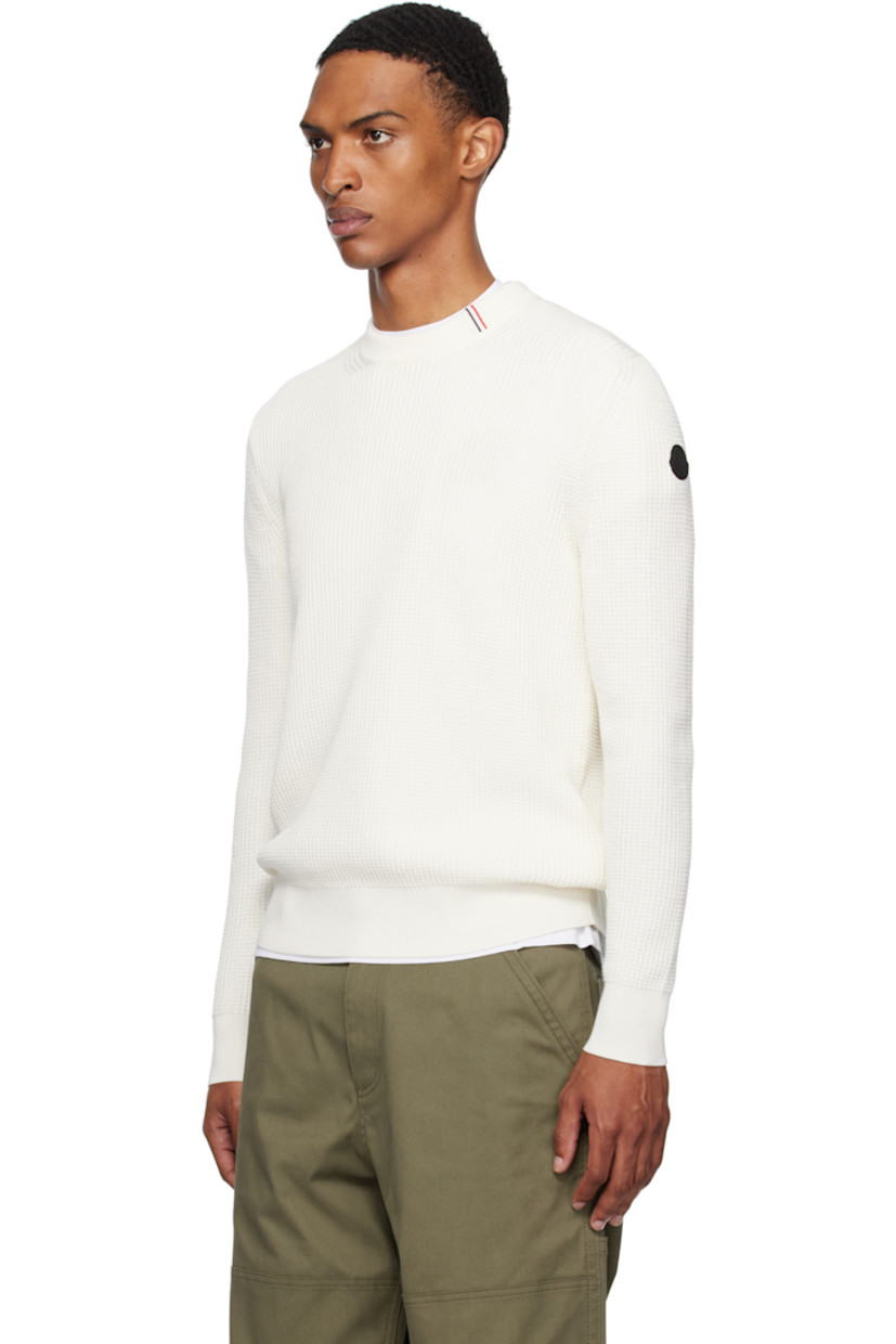 Waffle-knit cotton sweater.

· Rib-knit crewneck, hem, and cuffs
· Stripes embroidered at collar
· Rubberized logo patch at sleeve

Supplier color: Jet stream