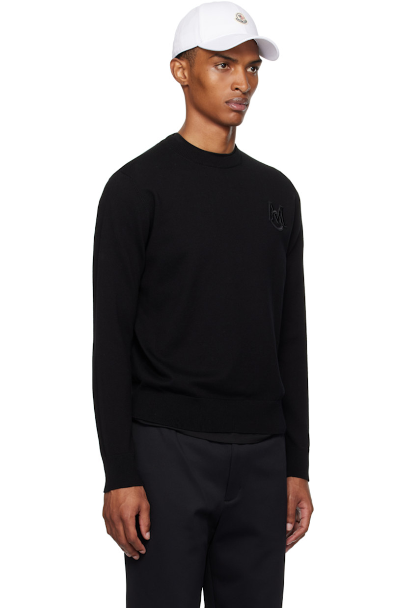 12-gauge knit cotton sweater.

· Lightweight
· Rib-knit crewneck, hem, and cuffs
· Embroidered logo patch at chest
· Felted logo patch at sleeve

Supplier color: Black