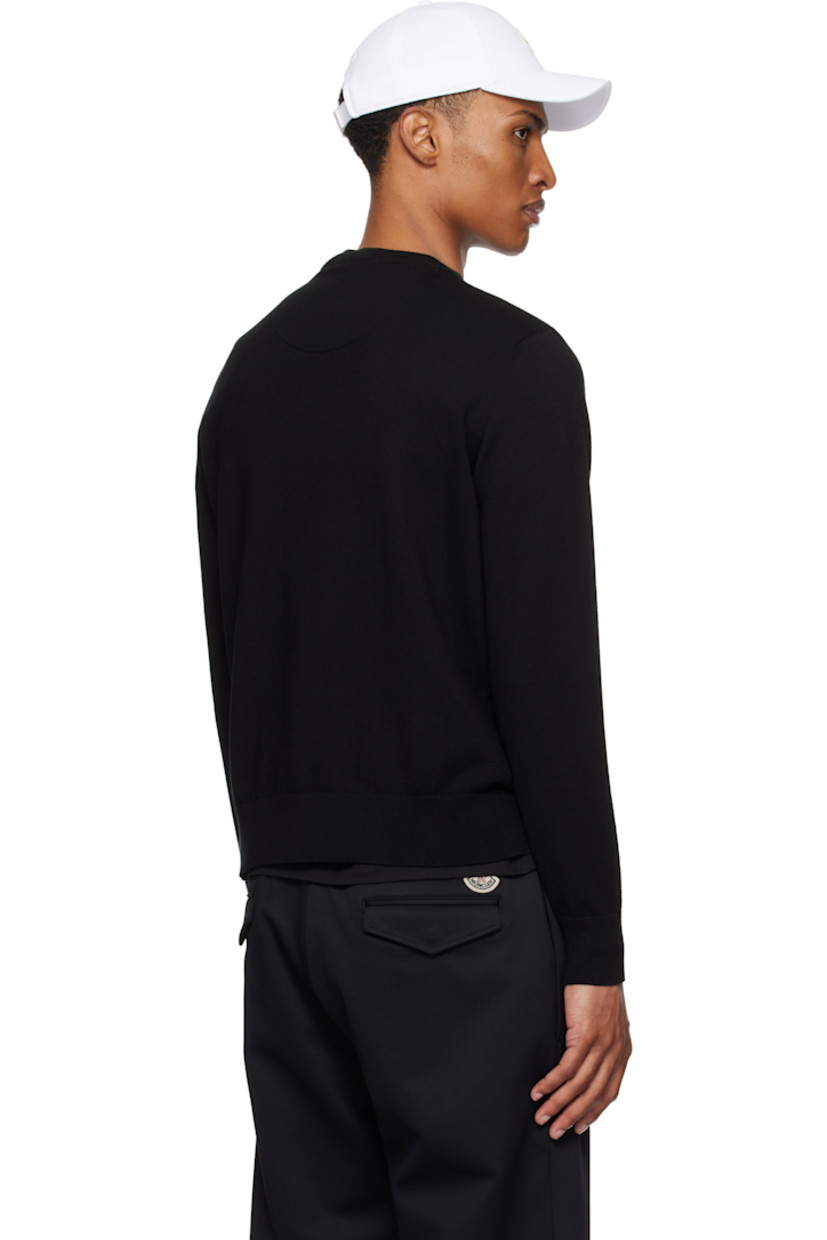 12-gauge knit cotton sweater.

· Lightweight
· Rib-knit crewneck, hem, and cuffs
· Embroidered logo patch at chest
· Felted logo patch at sleeve

Supplier color: Black
