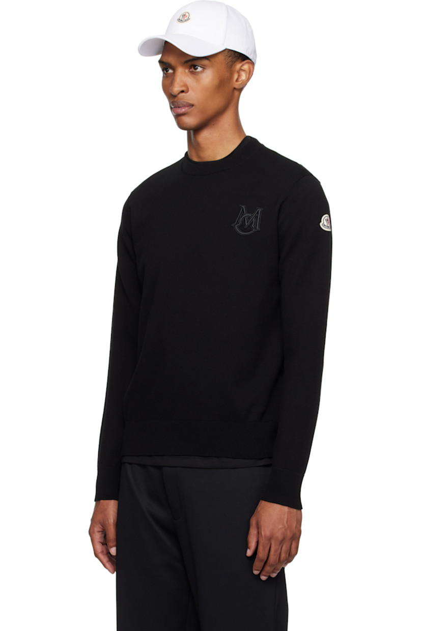 12-gauge knit cotton sweater.

· Lightweight
· Rib-knit crewneck, hem, and cuffs
· Embroidered logo patch at chest
· Felted logo patch at sleeve

Supplier color: Black