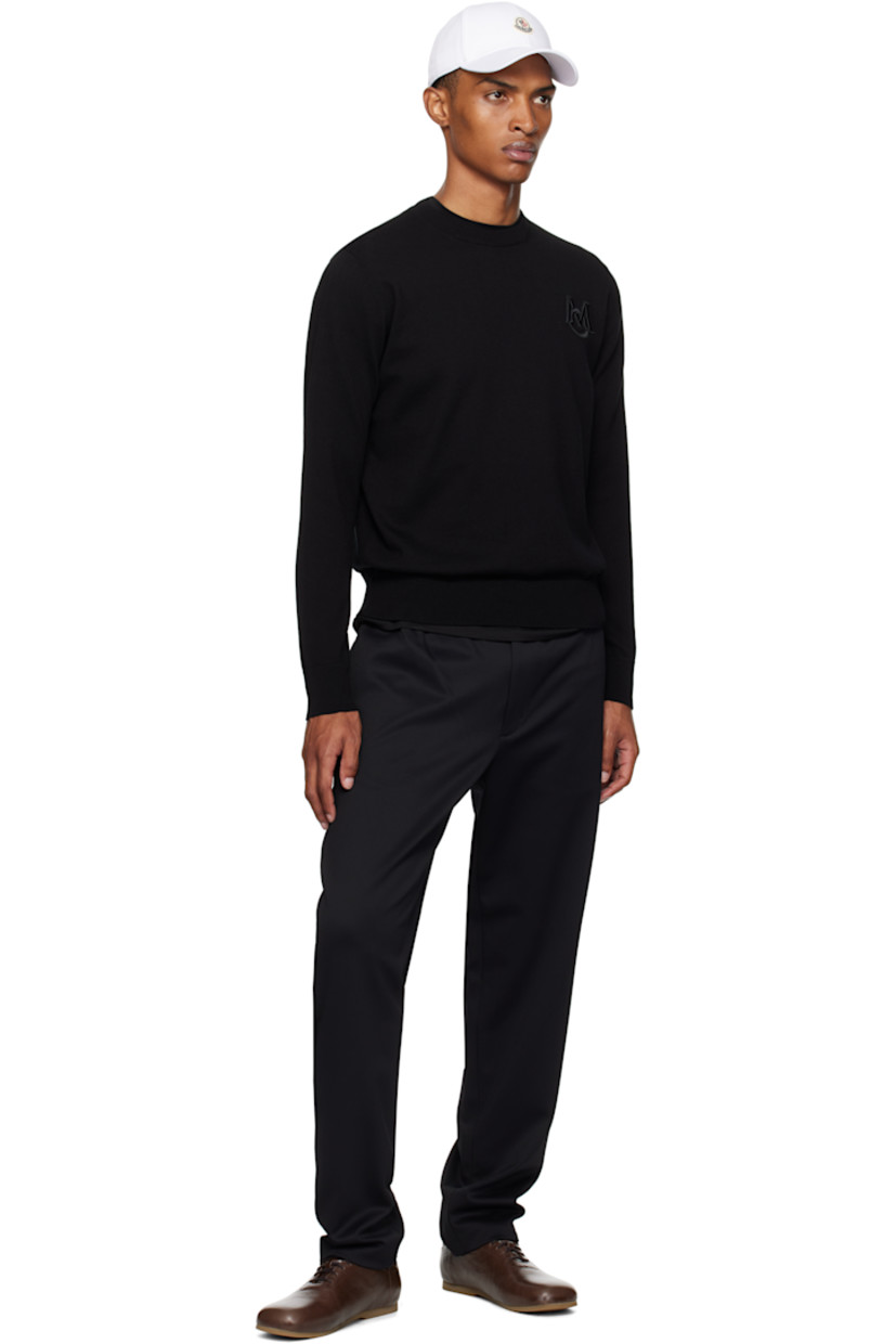 12-gauge knit cotton sweater.

· Lightweight
· Rib-knit crewneck, hem, and cuffs
· Embroidered logo patch at chest
· Felted logo patch at sleeve

Supplier color: Black