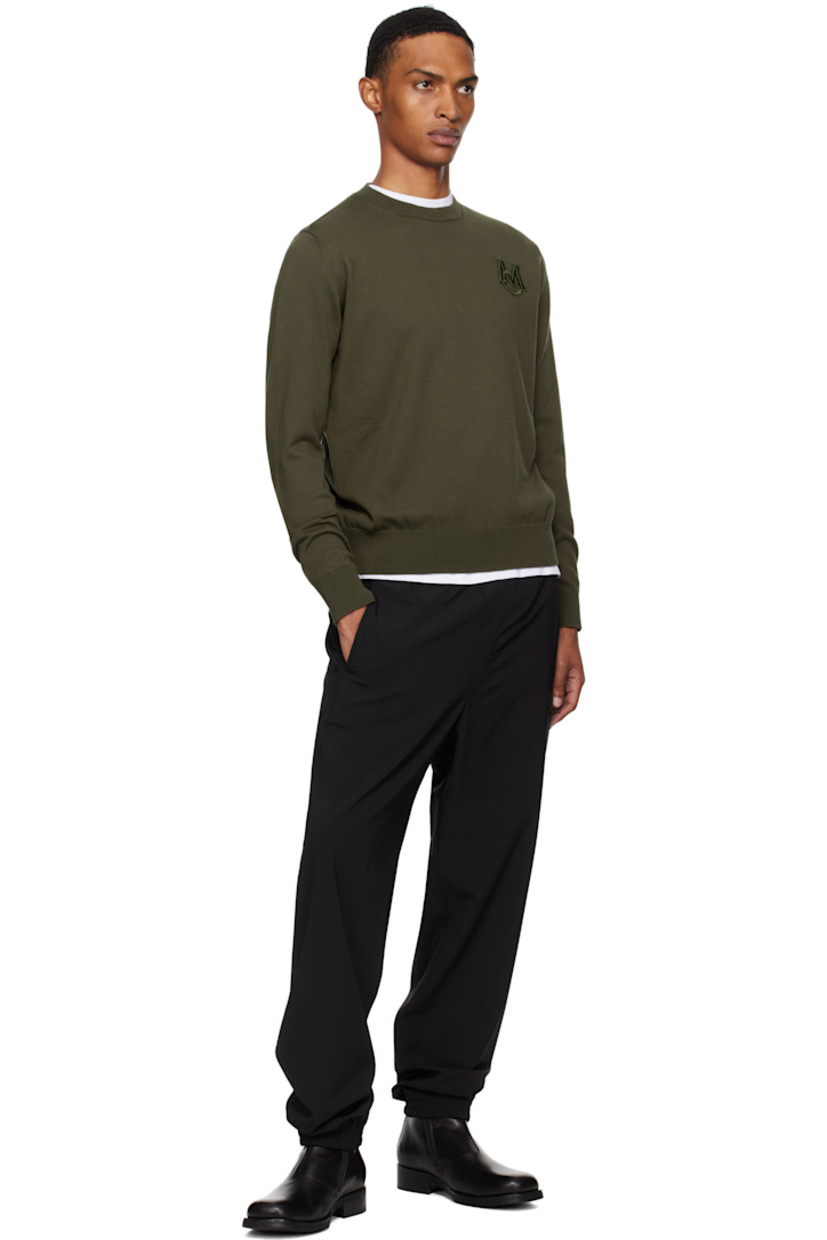 12-gauge knit cotton sweater.

· Lightweight
· Rib-knit crewneck, hem, and cuffs
· Embroidered logo patch at chest
· Felted logo patch at sleeve

Supplier color: Deep depths