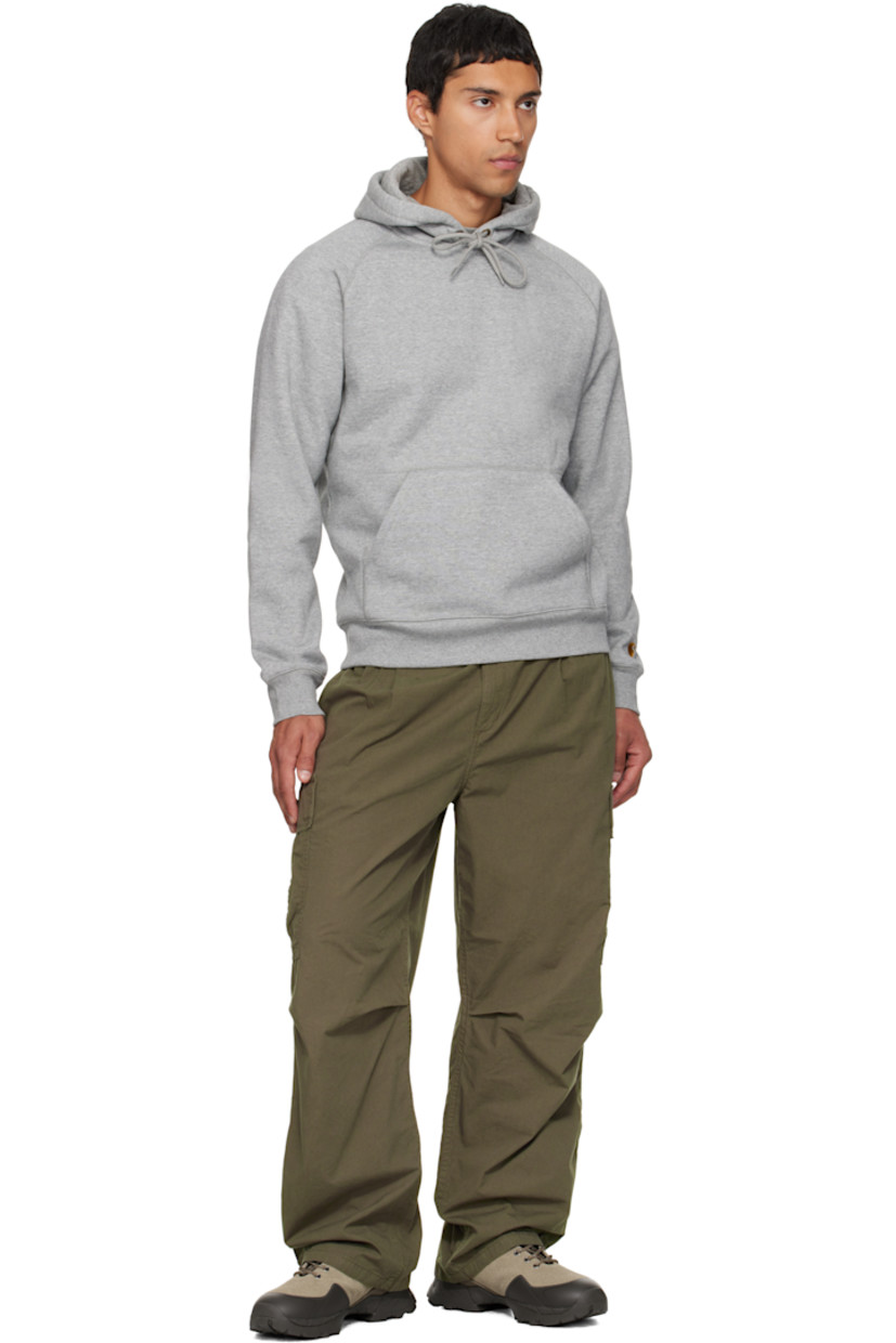 Cotton-blend fleece hoodie. 

· Drawstring at hood 
· Kangaroo pocket at waist
· Rib-knit hem and cuffs
· Raglan sleeves
· Logo embroidered at cuff

Supplier color: Heather grey/Gold