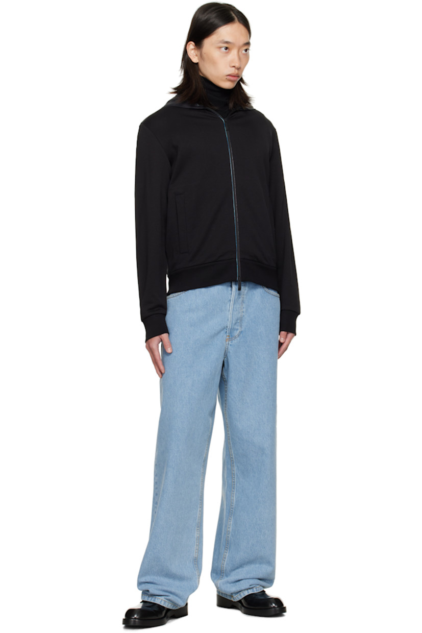 French terry jacket.

· Taffeta hood at stand collar
· Zip closure extends to hood
· Welt pockets at front
· Rib-knit hem and cuffs
· Logo patch at sleeve

Supplier color: Black