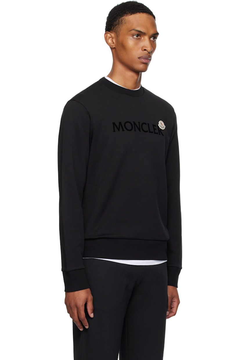 French terry sweatshirt.

· Rib-knit crewneck, hem, and cuffs
· Felted logo patch and flocked logo at chest

Supplier color: Black