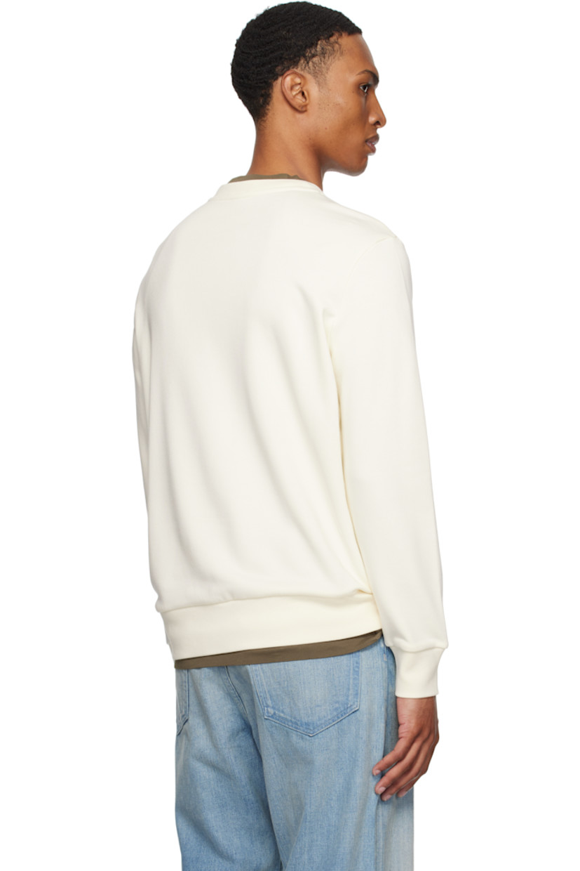 French terry sweatshirt.

· Rib-knit crewneck, hem, and cuffs
· Logo graphic embroidered at chest
· Felted logo patch at sleeve

Supplier color: Antique white