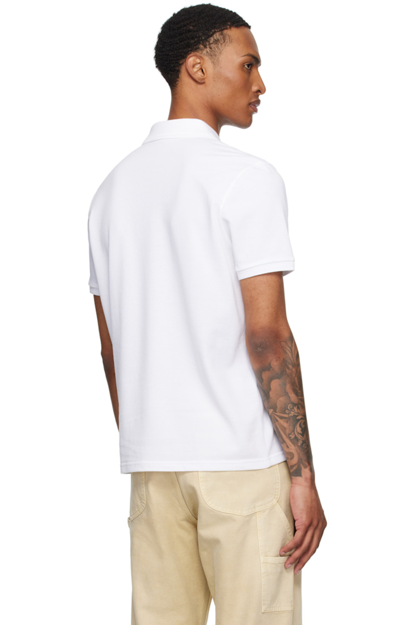 Cotton piqué polo.

· Rib-knit spread collar and cuffs
· Three-button placket
· Felted logo patch at chest
· Mother-of-pearl hardware

Supplier color: White