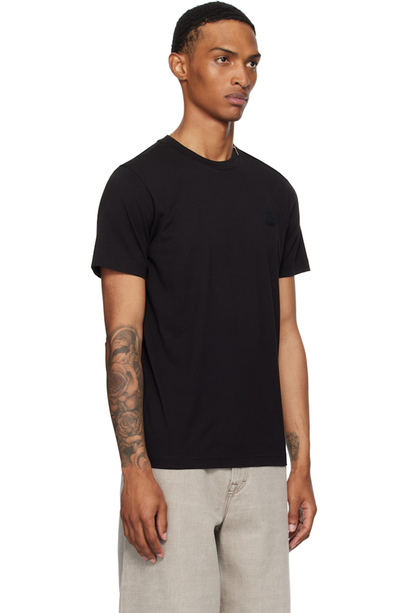 Organic cotton jersey T-shirt.

· Stripes embroidered at rib-knit crewneck
· Rubberized logo patch at chest

Supplier color: Black