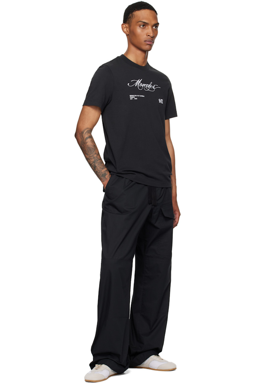 Cotton jersey T-shirt.

· Rib-knit crewneck
· Logo and text embroidered at front
· Felted logo patch at sleeve

Supplier color: Smoky black