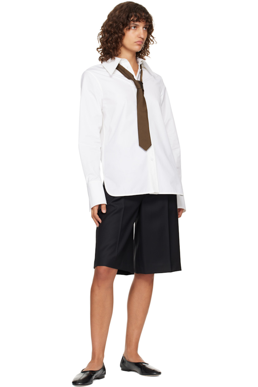 Lightweight canvas tie.

· Keeper loop at back face
· W2.5"

Supplier color: Brown