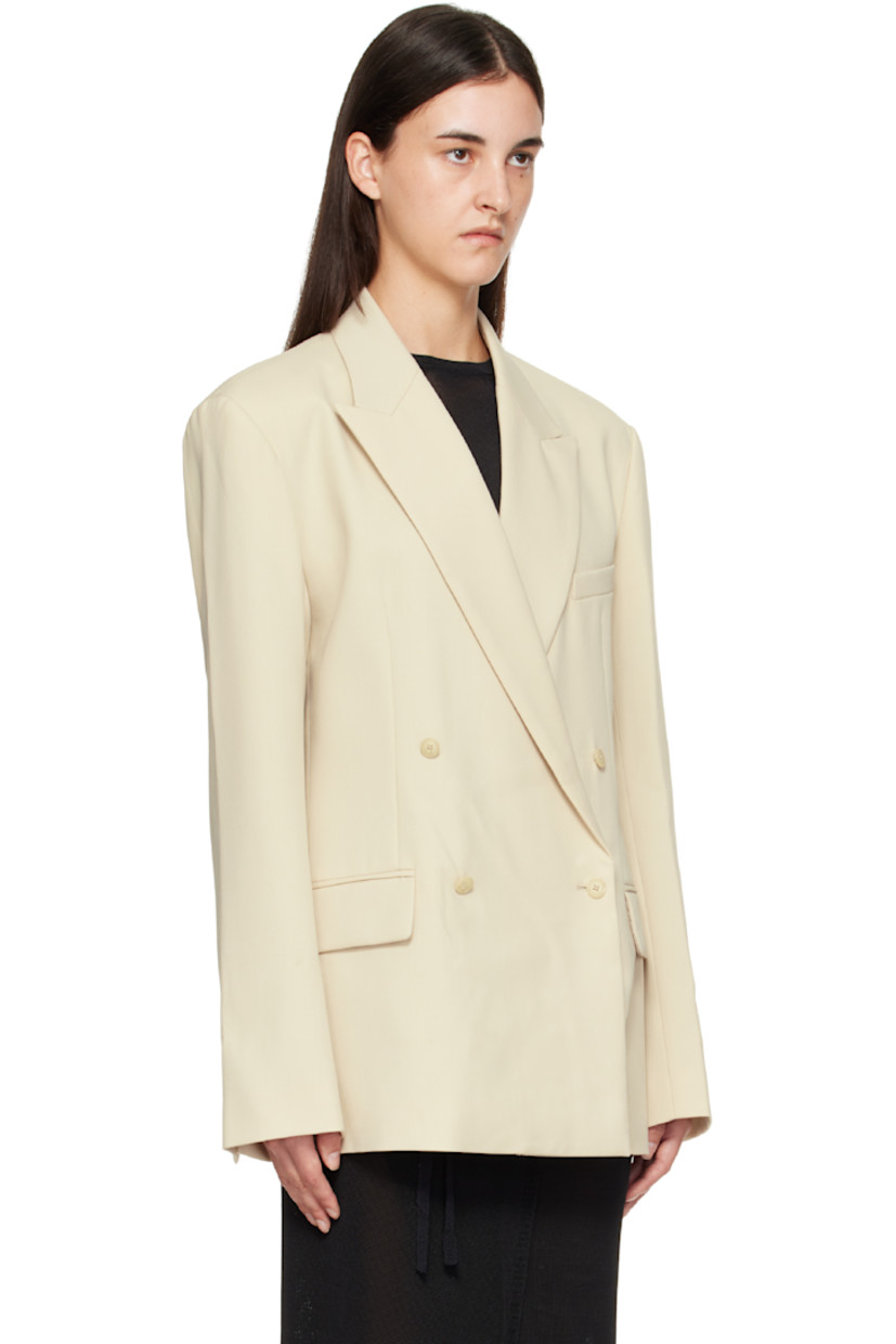 Cotton twill blazer.

· Peaked lapel
· Double-breasted button closure
· Welt pocket at chest
· Flap pockets at front
· Padded shoulders
· Surgeon's cuffs
· Welt pocket at interior
· Full satin lining

Supplier color: Cement