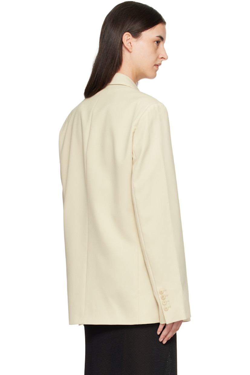 Cotton twill blazer.

· Peaked lapel
· Double-breasted button closure
· Welt pocket at chest
· Flap pockets at front
· Padded shoulders
· Surgeon's cuffs
· Welt pocket at interior
· Full satin lining

Supplier color: Cement