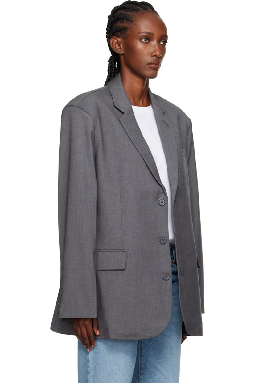 Plain-woven lyocell-blend blazer.

· Notched lapel
· Button closure
· Welt pocket at chest
· Flap pockets at waist
· Buttoned surgeon's cuffs
· Full satin lining 

Supplier color: Dark grey melange