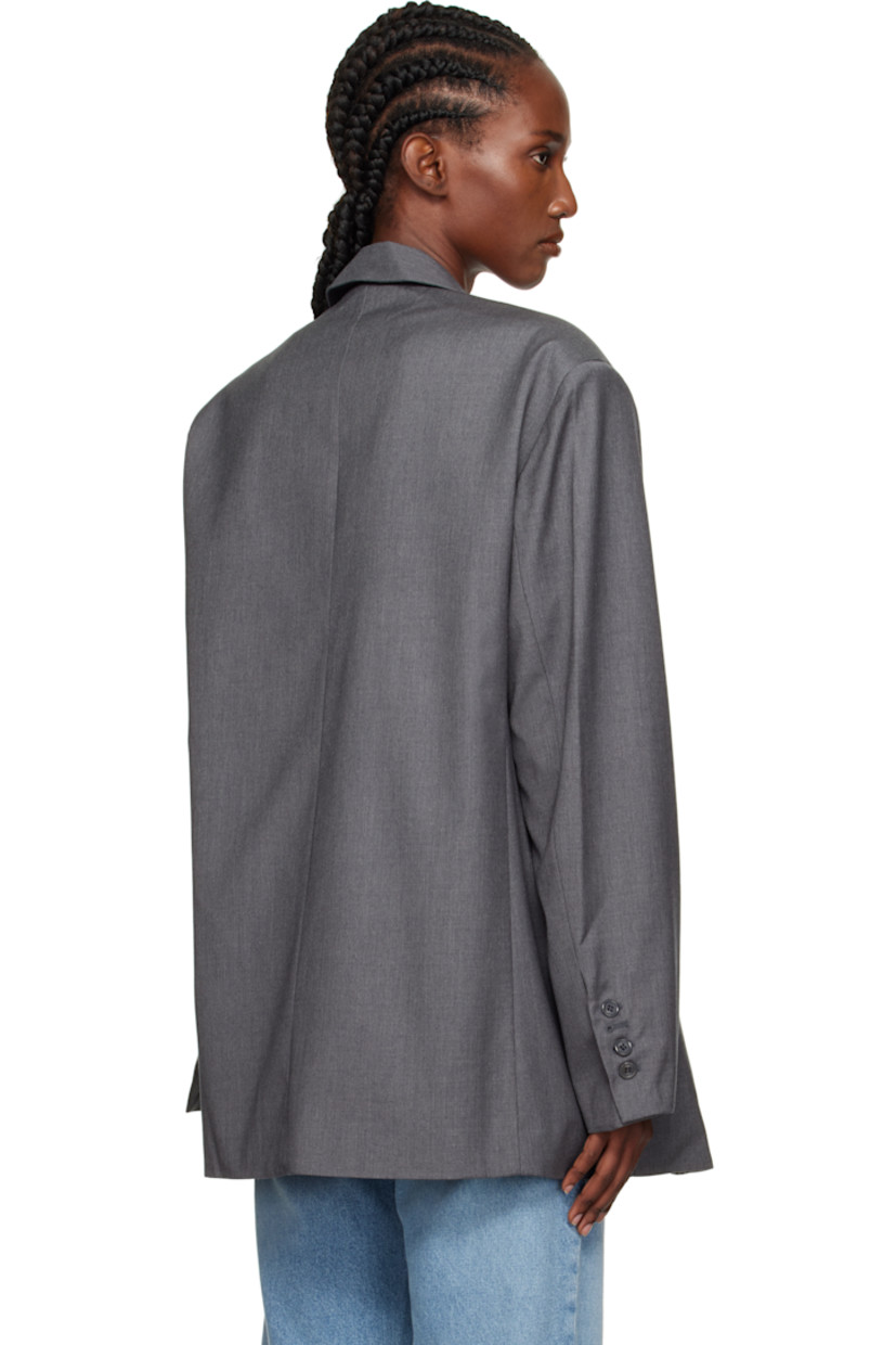 Plain-woven lyocell-blend blazer.

· Notched lapel
· Button closure
· Welt pocket at chest
· Flap pockets at waist
· Buttoned surgeon's cuffs
· Full satin lining 

Supplier color: Dark grey melange
