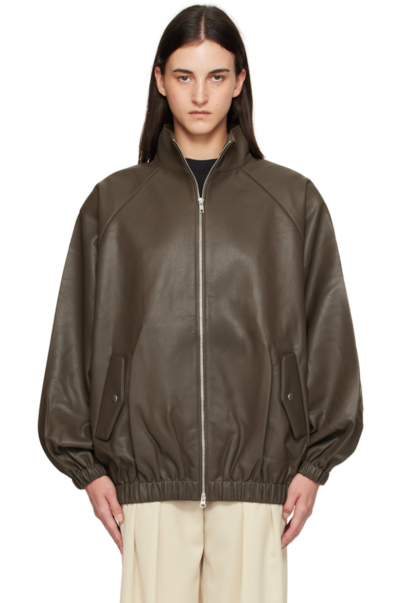 Grained faux-leather bomber-style jacket. 

· Stand collar
· Two-way zip closure
· Press-stud flap pockets at waist
· Elasticized hem and cuffs
· Raglan sleeves
· Storm flap at back
· Full satin lining

Supplier color: Khaki Brown