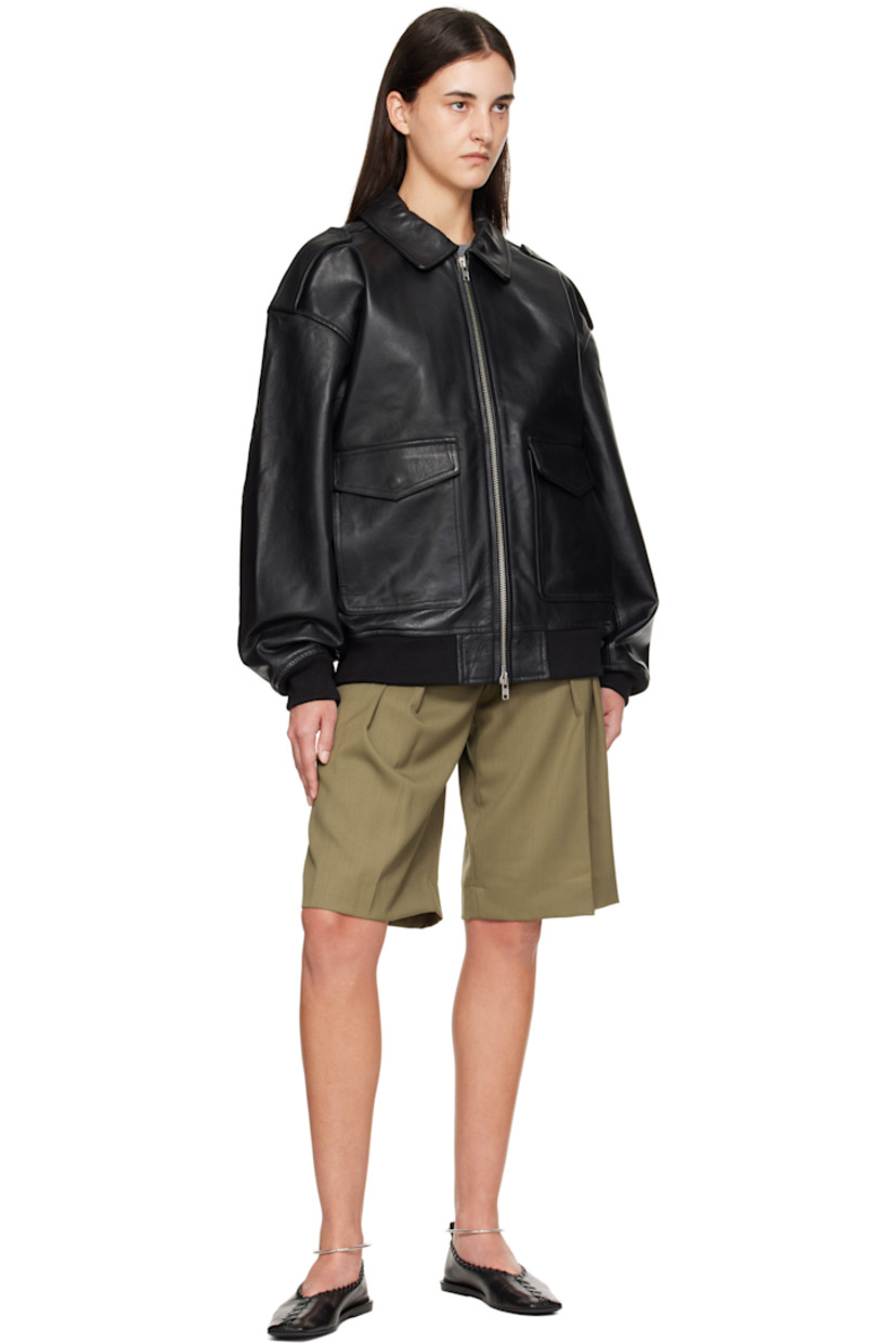 Heavyweight grained leather jacket.

· Oversized
· Spread collar
· Two-way zip closure
· Flap pockets and concealed welt pockets at waist
· Fixed epaulets
· Dropped shoulders
· Rib-knit hem and cuffs
· Full satin lining

Supplier color: Black