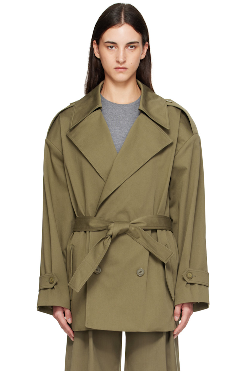 Stretch cotton gabardine trench coat.

· Notched lapel
· Double-breasted button closure
· Belt loops and detachable self-tie belt
· Flap pockets at waist
· Epaulets at padded shoulders
· Pleats at sleeves
· Button tab at cuffs
· Storm flap at back 
· Full satin lining

Supplier color: Khaki