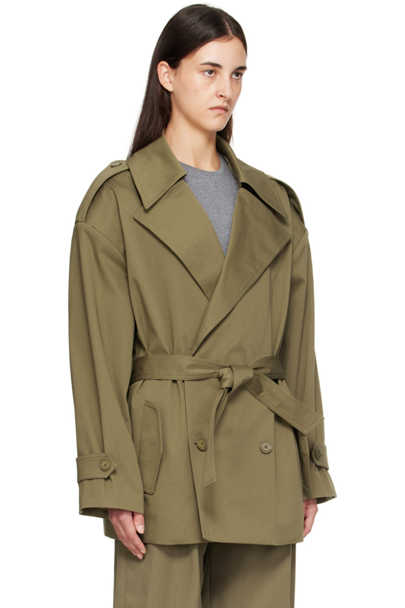 Stretch cotton gabardine trench coat.

· Notched lapel
· Double-breasted button closure
· Belt loops and detachable self-tie belt
· Flap pockets at waist
· Epaulets at padded shoulders
· Pleats at sleeves
· Button tab at cuffs
· Storm flap at back 
· Full satin lining

Supplier color: Khaki