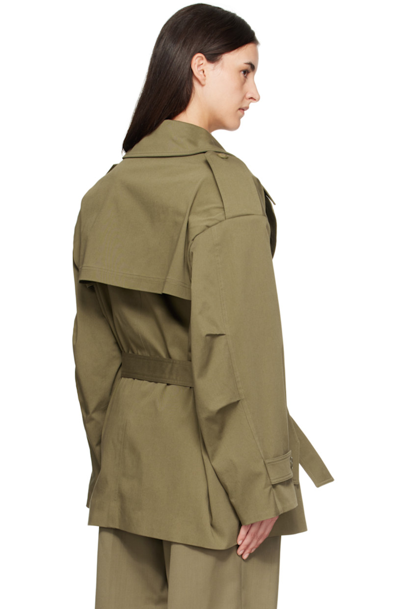 Stretch cotton gabardine trench coat.

· Notched lapel
· Double-breasted button closure
· Belt loops and detachable self-tie belt
· Flap pockets at waist
· Epaulets at padded shoulders
· Pleats at sleeves
· Button tab at cuffs
· Storm flap at back 
· Full satin lining

Supplier color: Khaki