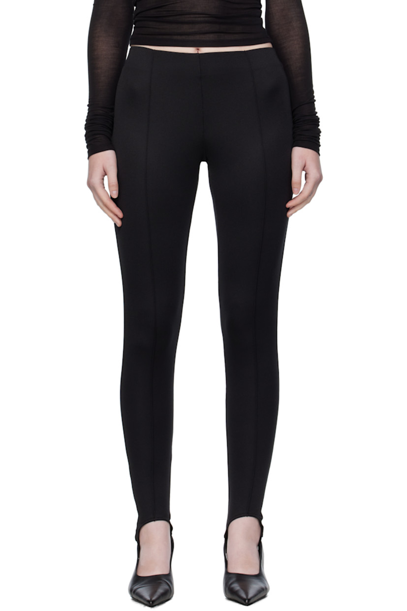 Stretch jersey leggings. 

· High-rise 
· Elasticized waistband
· Central pinched seams at legs
· Stirrup at cuffs

Supplier color: Black