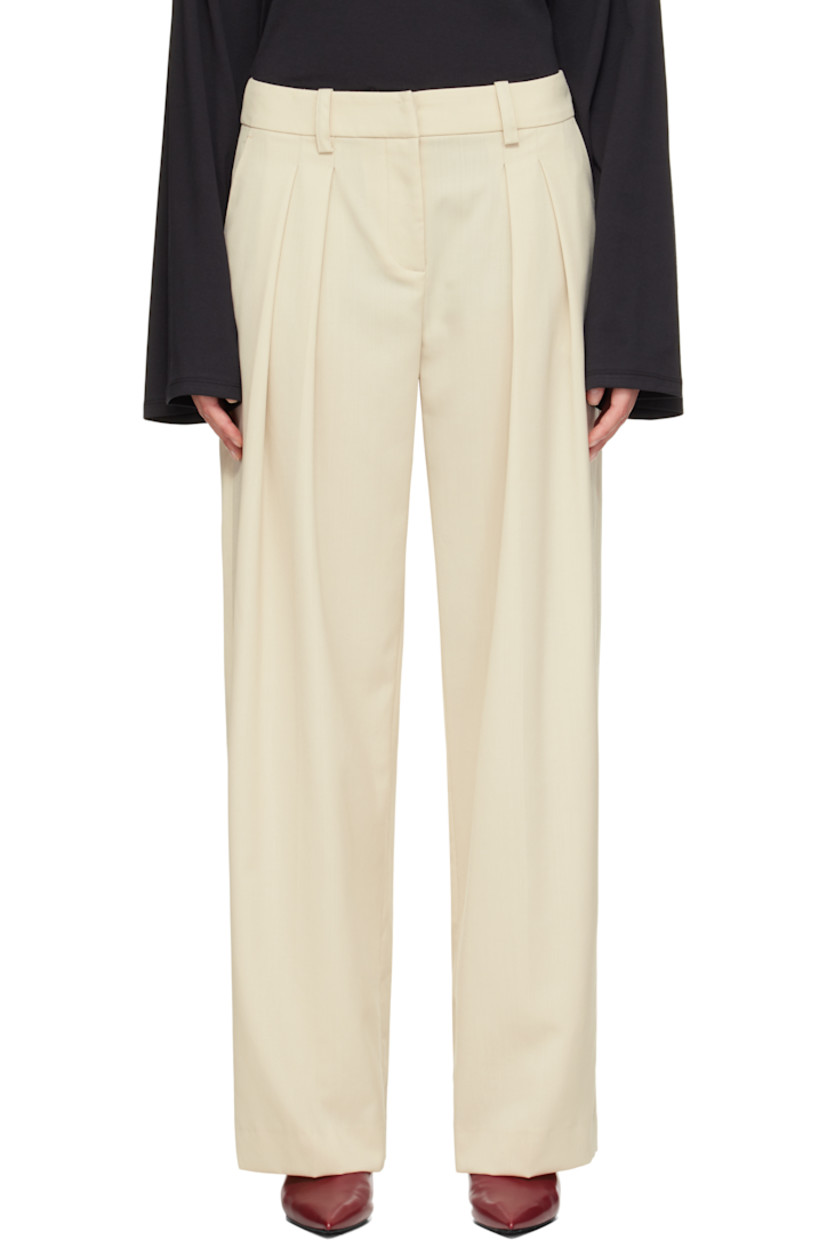 Virgin wool-blend twill trousers.

· Wide-leg
· High-rise
· Belt loops
· Three-pocket styling
· Zip fly
· Pleats at front
· Creased legs

Supplier color: Cement