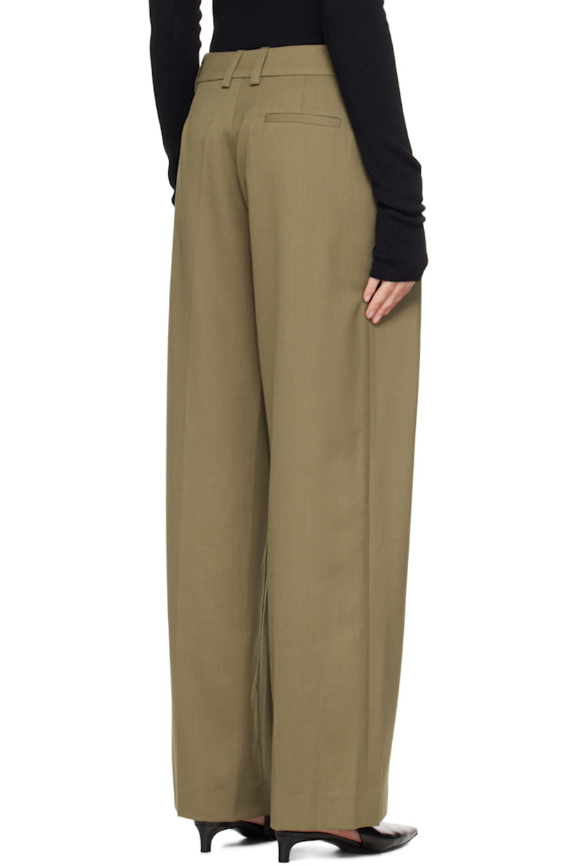 Virgin wool-blend twill trousers.

· Wide-leg
· High-rise
· Belt loops
· Three-pocket styling
· Zip fly
· Pleats at front
· Creased legs

Supplier color: Khaki
