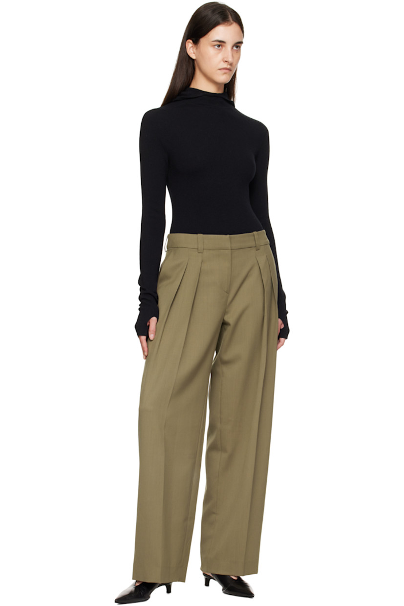 Virgin wool-blend twill trousers.

· Wide-leg
· High-rise
· Belt loops
· Three-pocket styling
· Zip fly
· Pleats at front
· Creased legs

Supplier color: Khaki