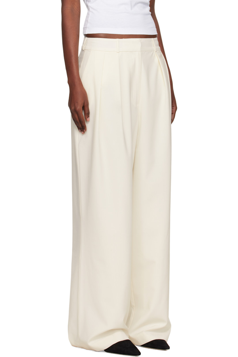 Lightweight plain-woven stretch virgin wool-blend trousers. 

· Wide-leg
· Belt loops
· Three-pocket styling
· Zip fly
· Pleats at front waistband
· Darts at back waistband
· Full satin lining

Supplier color: Ivory