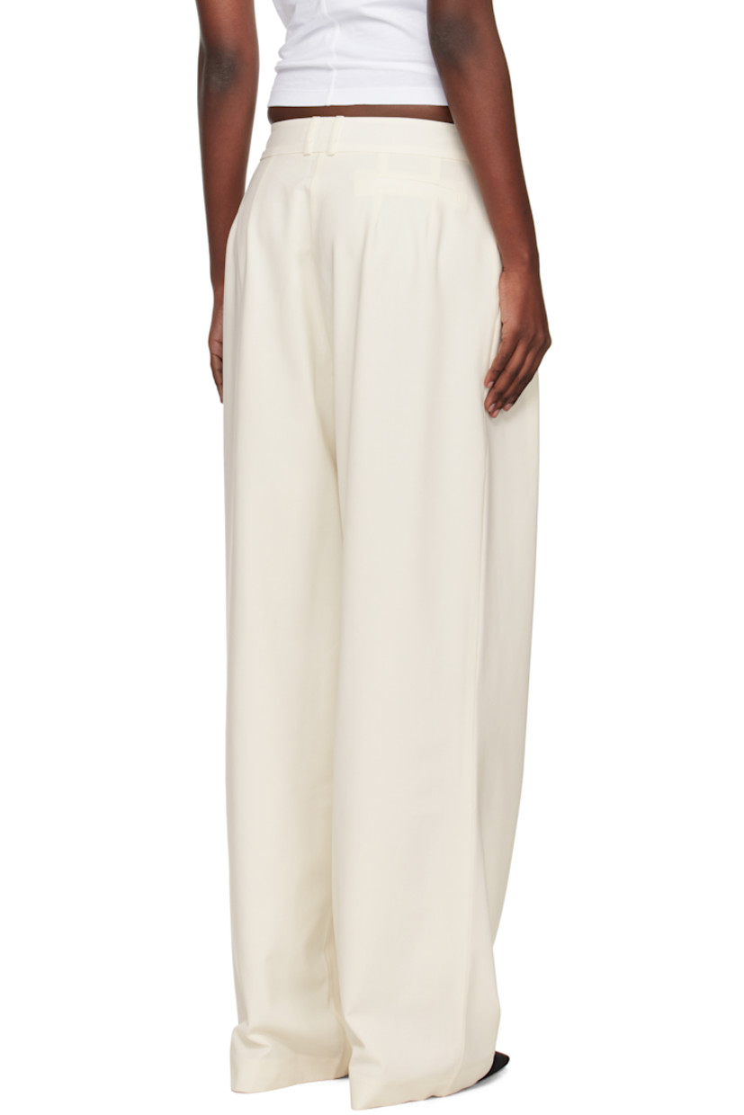 Lightweight plain-woven stretch virgin wool-blend trousers. 

· Wide-leg
· Belt loops
· Three-pocket styling
· Zip fly
· Pleats at front waistband
· Darts at back waistband
· Full satin lining

Supplier color: Ivory