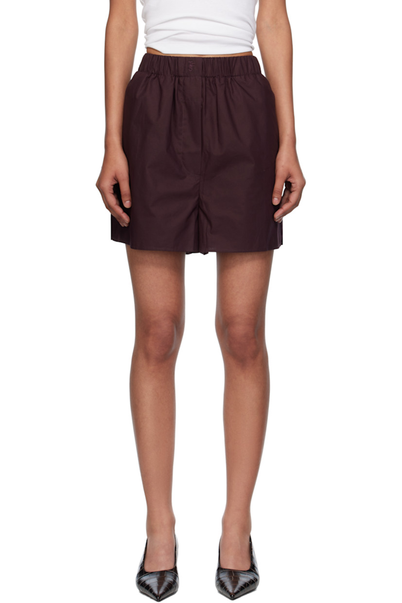Lightweight organic cotton poplin shorts. 

· High-rise
· Logo embroidered at elasticized waistband
· Two-pocket styling
· Mock fly
· Vented outseams
· Unlined

Supplier color: Dark plum