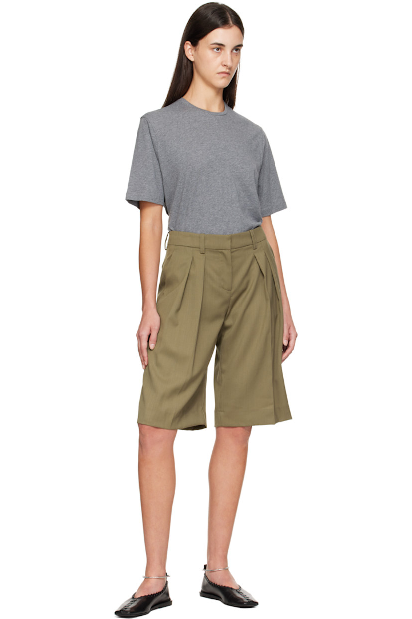 Virgin wool-blend twill shorts.

· High-rise
· Belt loops
· Three-pocket styling
· Zip fly
· Pleats at front
· Creased legs

Supplier color: Khaki