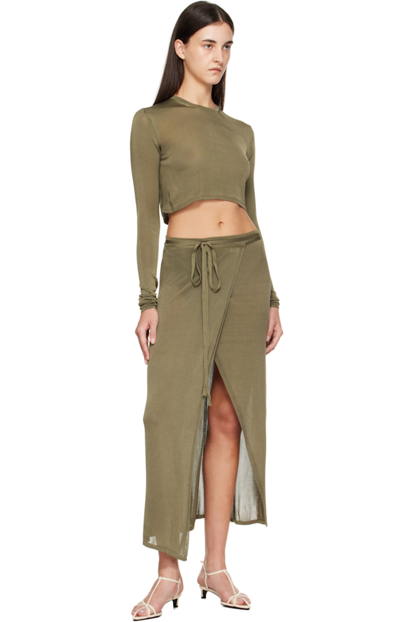 Semi-sheer knit viscose-blend maxi skirt.

· Wrap construction
· Self-tie closure

Supplier color: Khaki