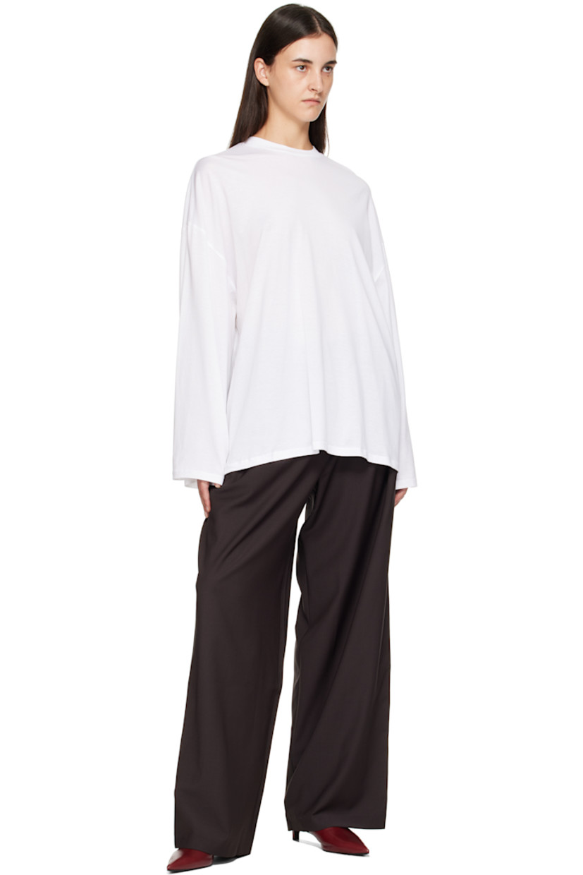 Lightweight organic cotton jersey T-shirt.

· Rib-knit crewneck
· Dropped shoulders
· Flared cuffs

Supplier color: White