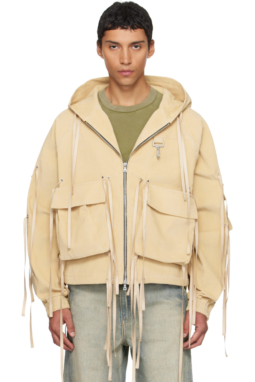 Cotton corduroy jacket.

· Detachable flap pockets with self-tie fastenings throughout
· Drawstring at hood
· Two-way zip closure
· Logo-engraved clasp at chest
· Seam pockets
· Raglan sleeves
· Logo patch at cuff
· Elasticized cuffs

Supplier color: Khaki