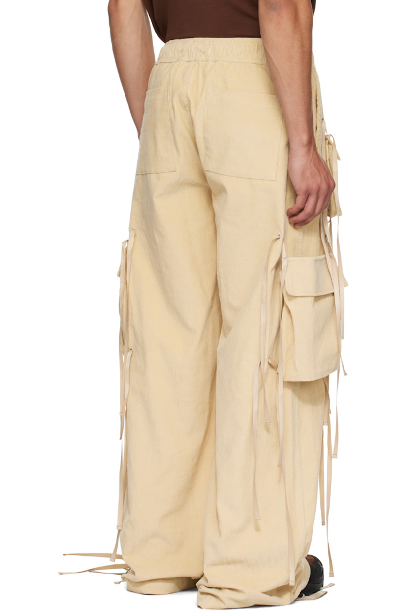 Cotton corduroy cargo pants.

· Wide-leg 
· Self-tie drawstrings and grommets throughout 
· Elasticized waistband
· Four-pocket styling
· Mock fly 
· Loop and logo-engraved carabiner at front waist 
· Detachable cargo pockets at legs

Supplier color: Khaki