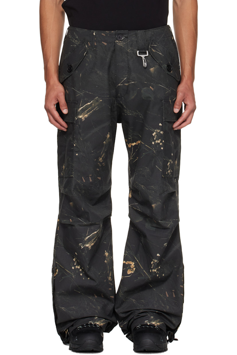 Cotton ripstop cargo pants.

· Camouflage pattern printed throughout
· Wide-leg 
· Belt loops
· Four-pocket styling
· Zip fly 
· Loop and logo-engraved carabiner at front waist 
· Flap pocket at outseams
· Darts at knees
· Buttoned vent at self-tie drawstring at cuffs

Supplier color: Camo