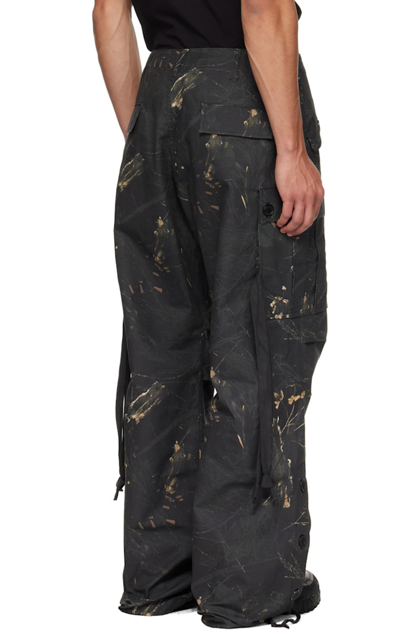Cotton ripstop cargo pants.

· Camouflage pattern printed throughout
· Wide-leg 
· Belt loops
· Four-pocket styling
· Zip fly 
· Loop and logo-engraved carabiner at front waist 
· Flap pocket at outseams
· Darts at knees
· Buttoned vent at self-tie drawstring at cuffs

Supplier color: Camo