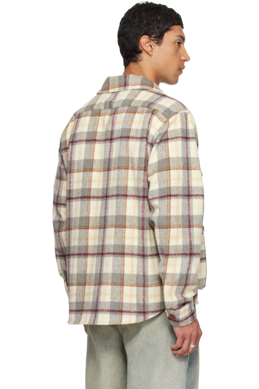 Cotton flannel shirt.

· Check pattern throughout
· Spread collar
· Button closure
· Logo-engraved clasp at chest
· Flap pockets at front
· Logo patch at cuff
· Buttoned barrel cuffs

Supplier color: Grey