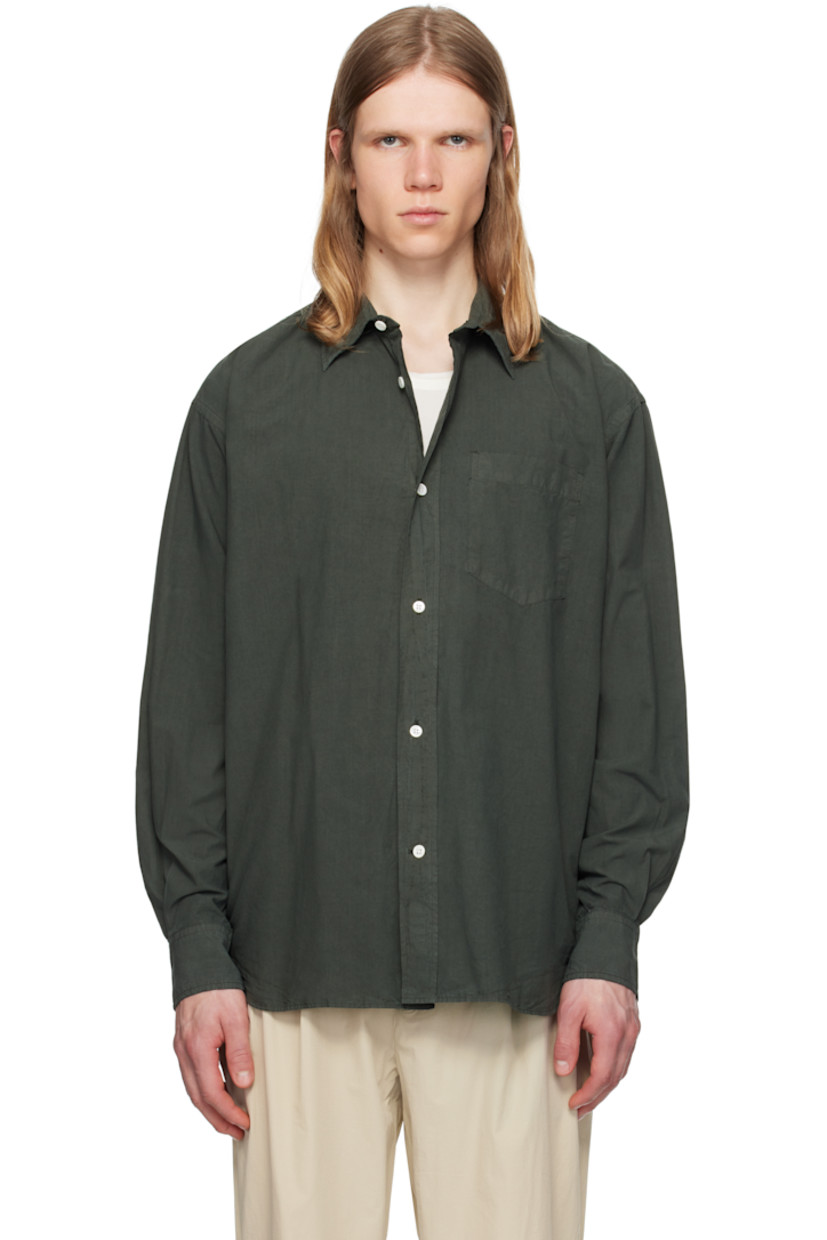 Cotton- and tencel-blend poplin shirt.

· Spread collar
· Button closure
· Patch pocket
· Shirttail hem
· Adjustable buttoned barrel cuffs
· Box pleat at back yoke
· Mother-of-pearl hardware

Supplier color: Black olive