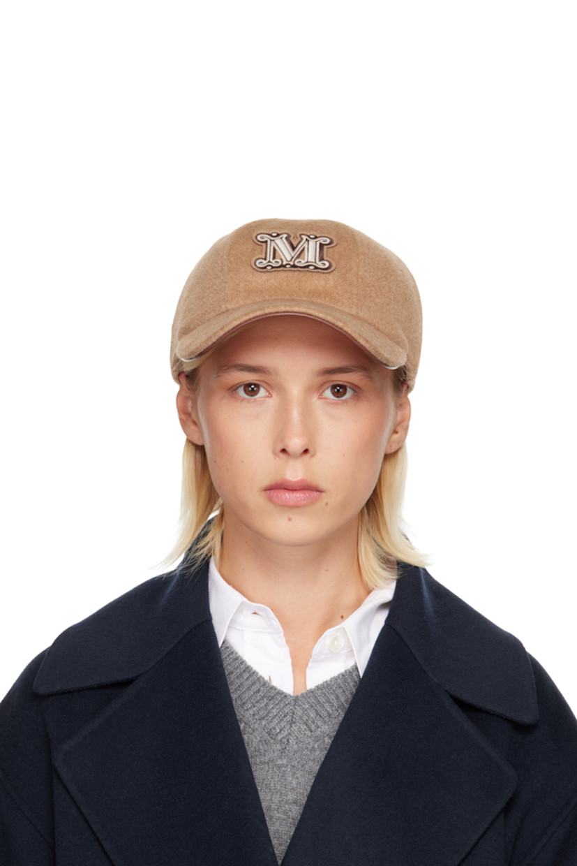 Felted camel wool cap.

· Embroidered logo patch at face
· Curved brim 
· Logo-engraved pin-buckle fastening at back
· Faille browband
· Logo-woven satin lining 

Supplier color: Camel